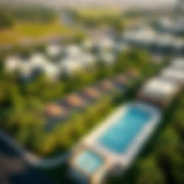 Aerial Perspective of the Vibrant Community Aerial view of the Expo Valley Villas community surrounded by lush greenery